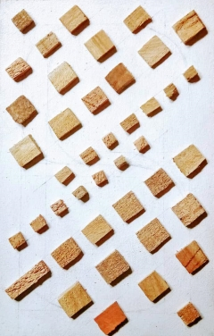 Pieces of wood on a painted board